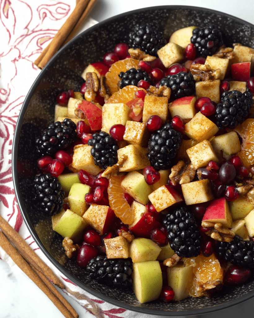 Fall Fruit Salad: Discover the Ultimate Seasonal Recipe! 8 Colorful autumn fruit salad featuring chopped apples and berries for Thanksgiving recipes.
