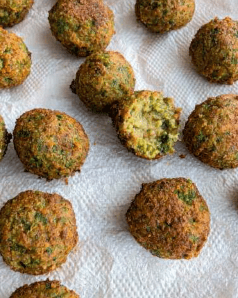 Authentic Falafel: Discover the Perfect Recipe Today! 19 fully cooked falafel balls resting on paper towel after being fried.