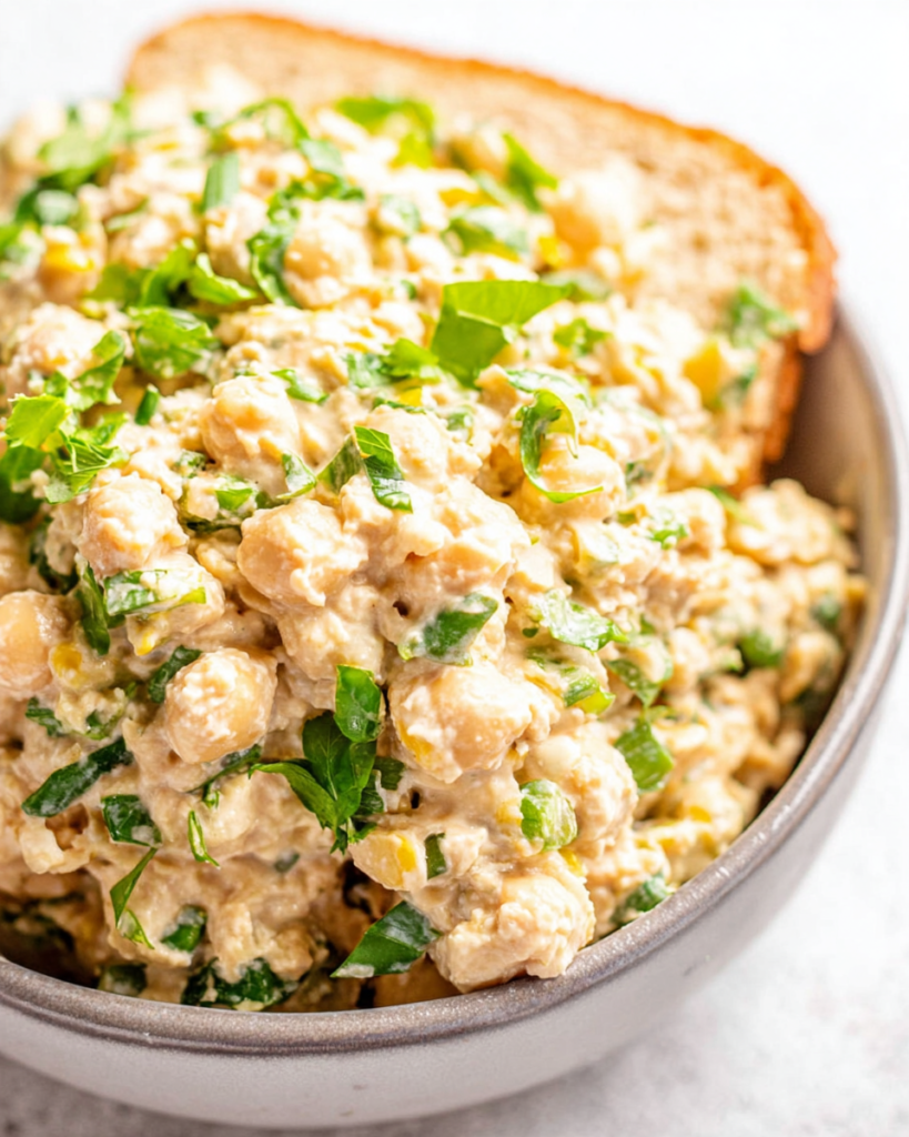 Chickpea salad sandwich in a large bowl.